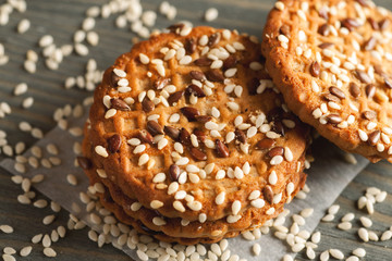 Cookies with sesame on a wooden table