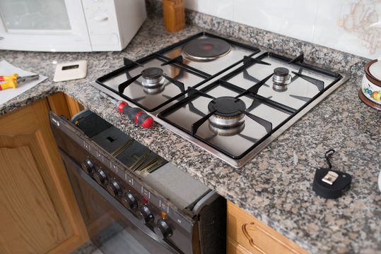 Gas hob and oven in a kitchen