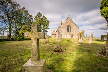 Fototapeta na wymiar Gravestone Cross at Heavenfield in St Oswald's Church Northumberland