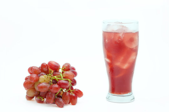 Grape juice and bunch of grapes.