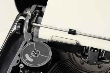 Old typewriter with paper, close up