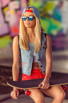 Beautiful skateboarding girl
