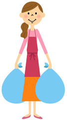 ゴミを出すエプロンの女性  