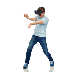 happy man in virtual reality headset or 3d glasses