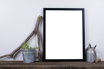 Scandinavian style empty photo frame mock up. Minimal home decor