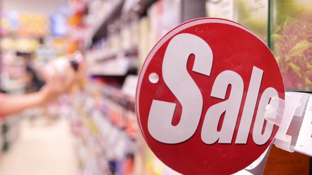Red Sale or Discount Sign in Supermarket