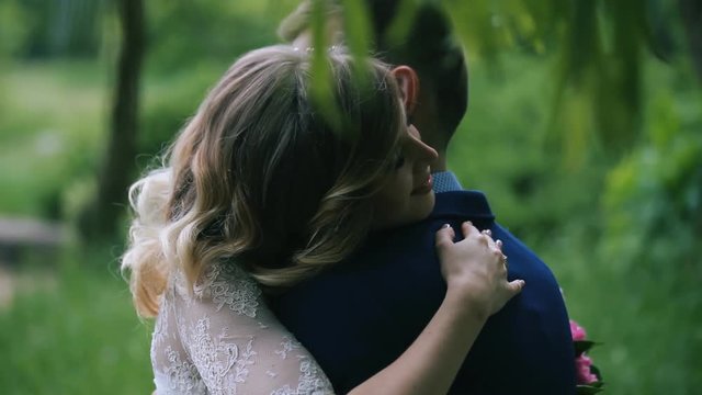 loving woman hugging her boyfriend