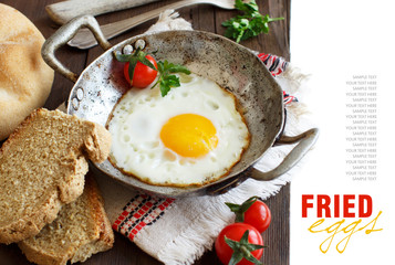 Fried egg on an old frying pan