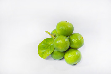 Green Lemons isolated on white background