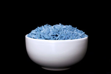 bowl full of herb rice isolated on black