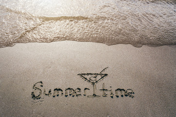 Summer time hand drawn lettering text and cocktail glass on sand. Sunburst vacation postcard template.