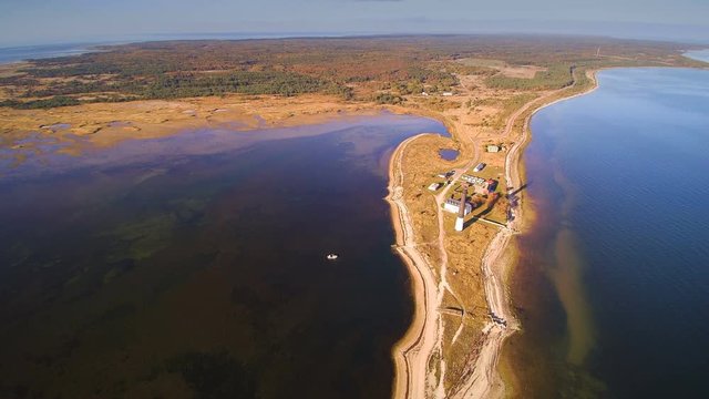 The northest point of Saarema island in an aerial view seen the Sorve lighthouse and small houses