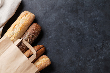 Mixed breads on stone table