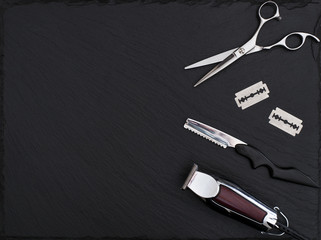 Barber shop tools on Black with place for text.