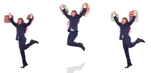 Arab man with shopping gifts on white