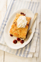 cherry crumble with whipped cream