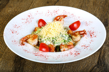 Caesar salad with tiger shrimps