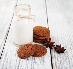 oatmeal cookies and bottle of milk
