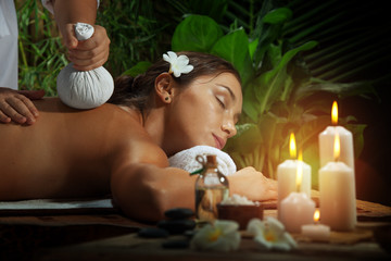 portrait of young beautiful woman in spa environment