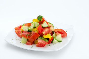 close up view of nice yummy salad on white back