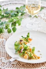 Russian salad served on a white plate