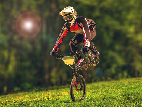 Man Riding Bmx Bike Performing A Trick