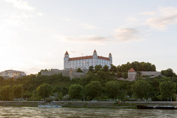 Fototapeta na wymiar Bratislava castle,parliament and Danube river just before sunset, Slovakia