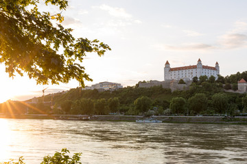 Fototapeta na wymiar Bratislava castle,parliament and Danube river just before sunset, Slovakia