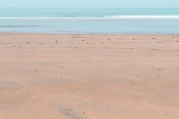 Fototapeta na wymiar Long exposure shot of the beach at Bude