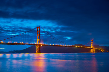 golden gate bridge at night lit up