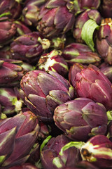 Vegetables artichokes on the counter