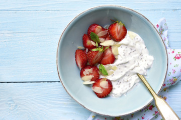 Chia seed pudding with strawberry in a bowl.