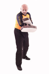 Trainer holding kick-shield