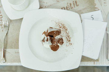 Chocolate cake on table