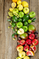 Fruits on wooden background