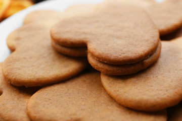 Heart shaped biscuits on plate, closeup