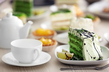 Piece of lime cake on table