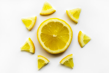 Sliced lemon like sun symbol