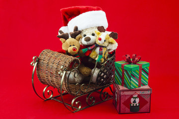 gifts beside wicker sleigh