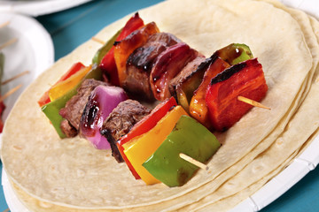 BBQ skewer on the picnic table