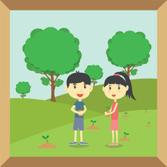 Boy and Girl planting small trees in garden