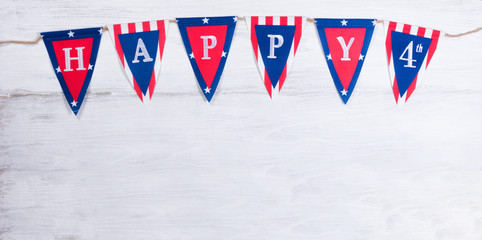 Fourth of July holiday banner on white wooden boards