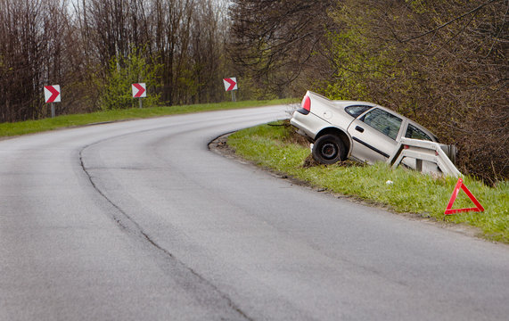 Fototapeta Crashed car after accident into a dich