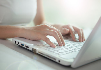 business woman hand typing on laptop keyboard