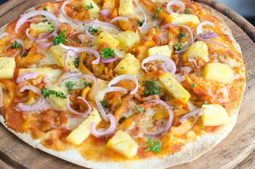 Hawaiian Chicken BBQ Italian Pizza on wood dish 