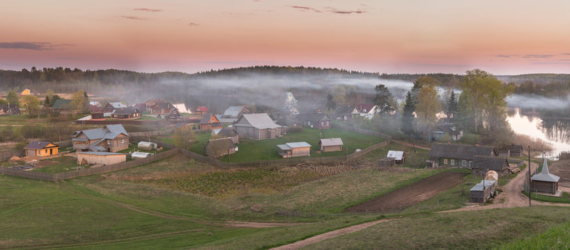 Panoramic view of the village, the sunset over the lake Russia, lake Seliger
