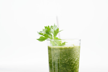 Fresh green juice smoothie made with organic green fruits and ve