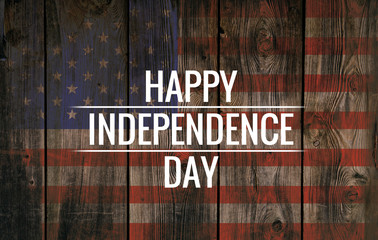 Inscription Happy independence day on old wood. Americana. Flag