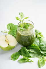 Fresh green juice smoothie made with organic green fruits and ve