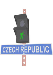 traffic light and a sign with the text 